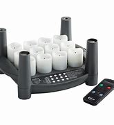 2.0T RECHARGEABLE CANDLE SET, 
INCLUDES 12 VOTIVE TIMER 
CANDLES, 1 11.75&quot;x9.75&quot;x9.75&quot;, 
12 POSITION EASYSTACK CHARGING 
TRAY (EA) 